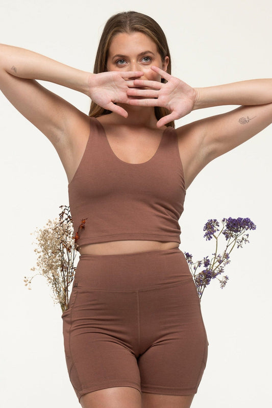 Why We Said Bai to Plastic: The Problem with Synthetic Activewear (And What to Wear Instead)
