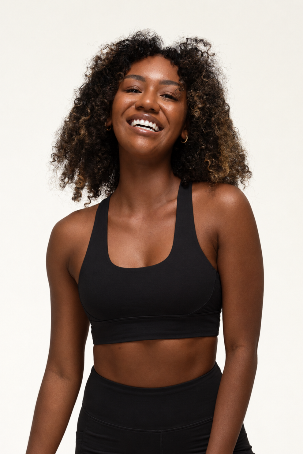 Model wearing a black natural fibre activewear outfit